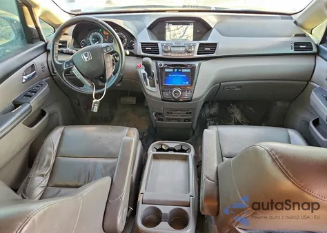 2014 Honda Odyssey Touring z USA, uszkodzony, nr VIN 5FNRL5H97EB077021